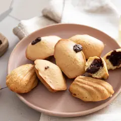 Délicieuses madeleines cœur chocolat, parfaites pour une pause gourmande. Une recette simple pour un plaisir garanti.