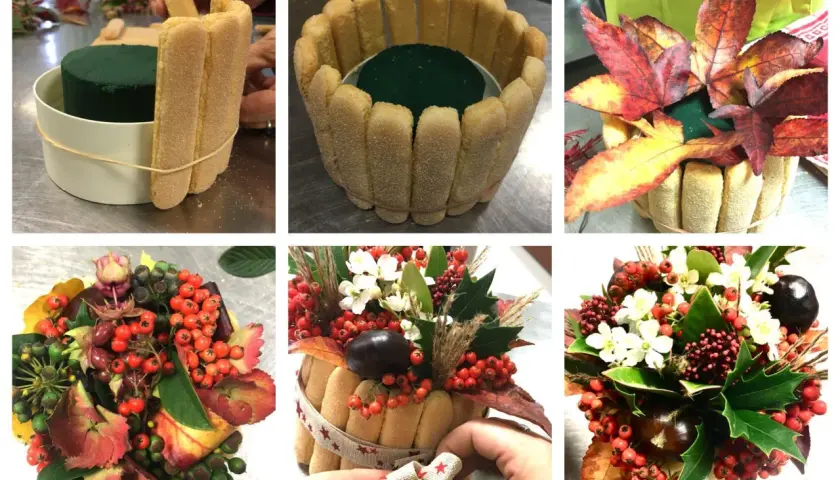 Création d'un gâteau fleurs automnal avec des biscuits à la cuillère, des baies rouges, des feuilles et des marrons.