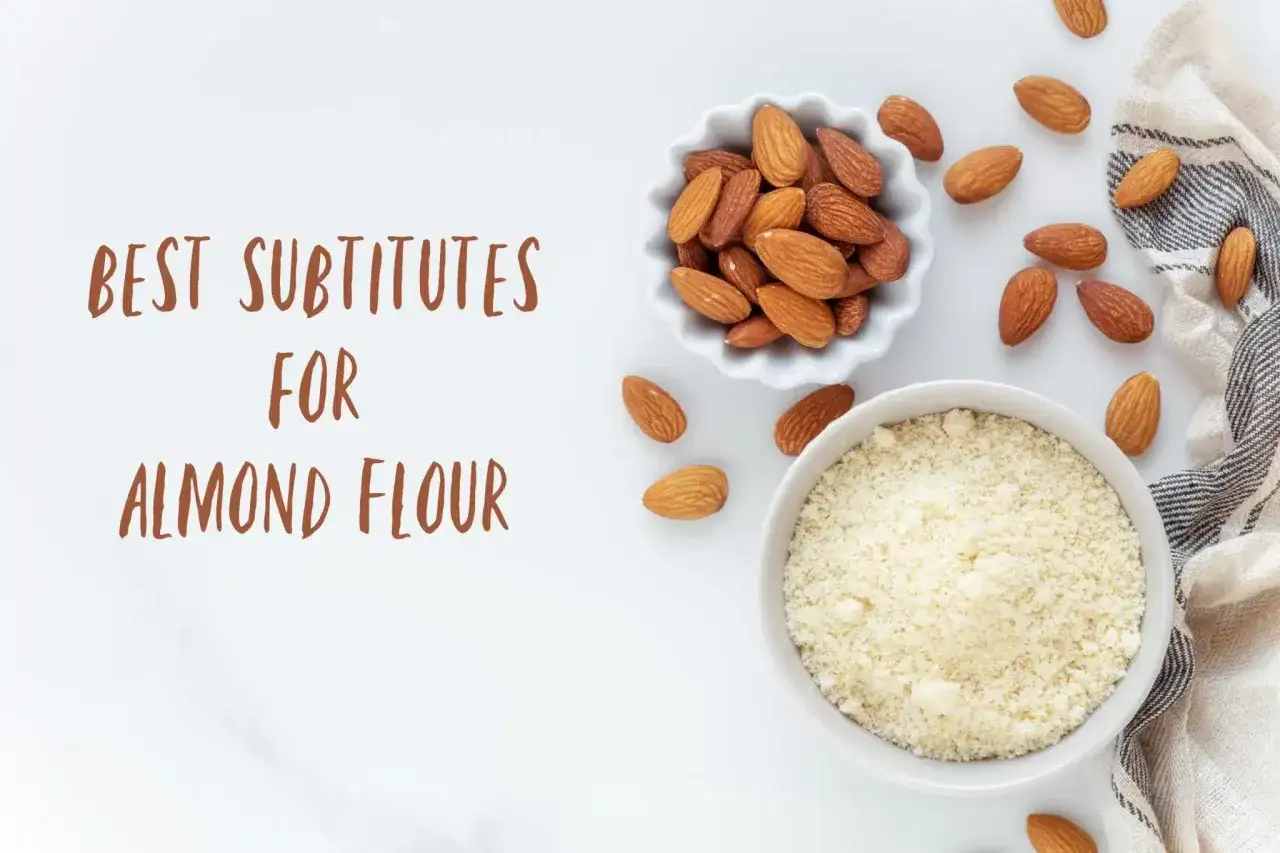 Amandes entières et poudre d'amande dans des bols. Découvrez par quoi remplacer la poudre d'amande pour vos recettes.